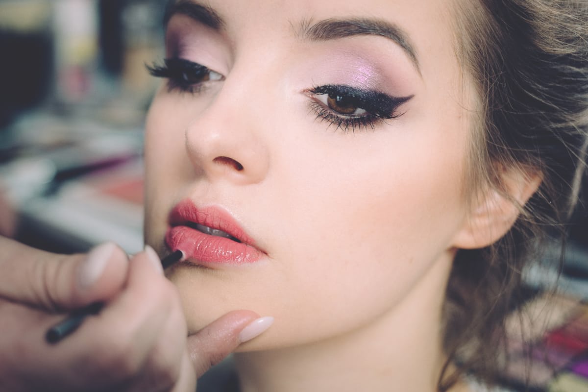 Polished beauty look with bold makeup